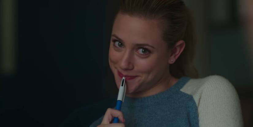 Betty holding a multicolored pen in season 2