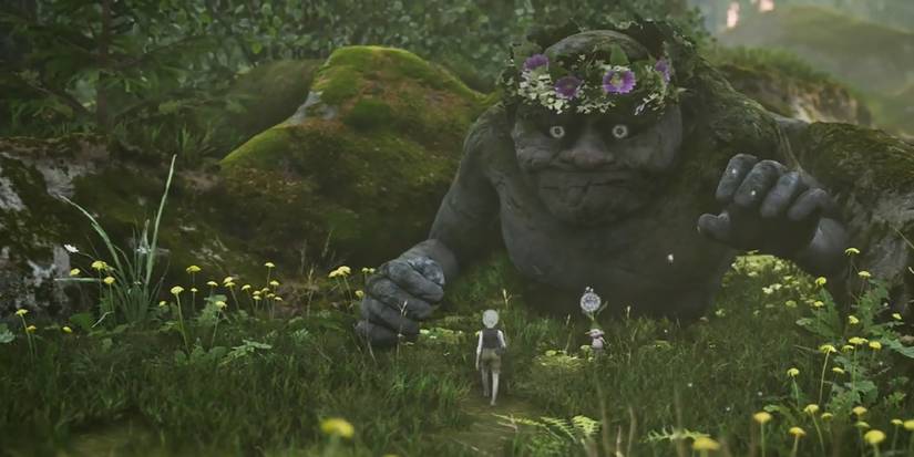 A small white-haired boy approaches a troll half-sunk into the ground. 