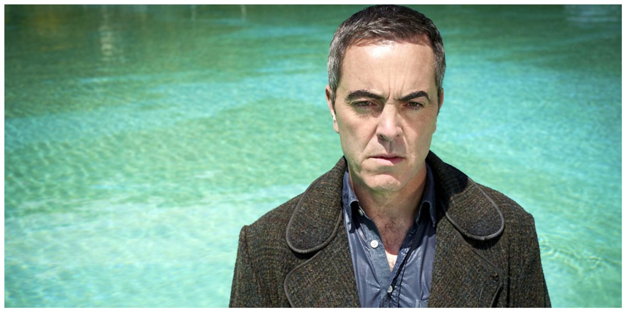 James Nesbitt as Tony in The Missing looking concerned and standing in front of an area of water