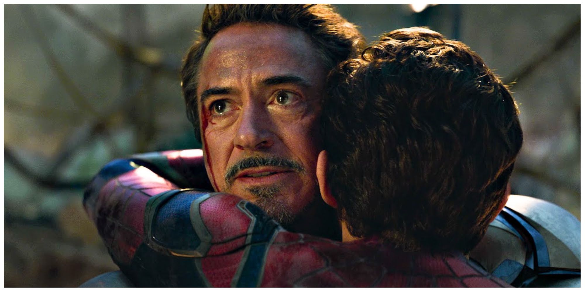 Robert Downey Jr. as Tony Stark, Iron Man. Tom Holland as Peter Parker, Spider-Man.