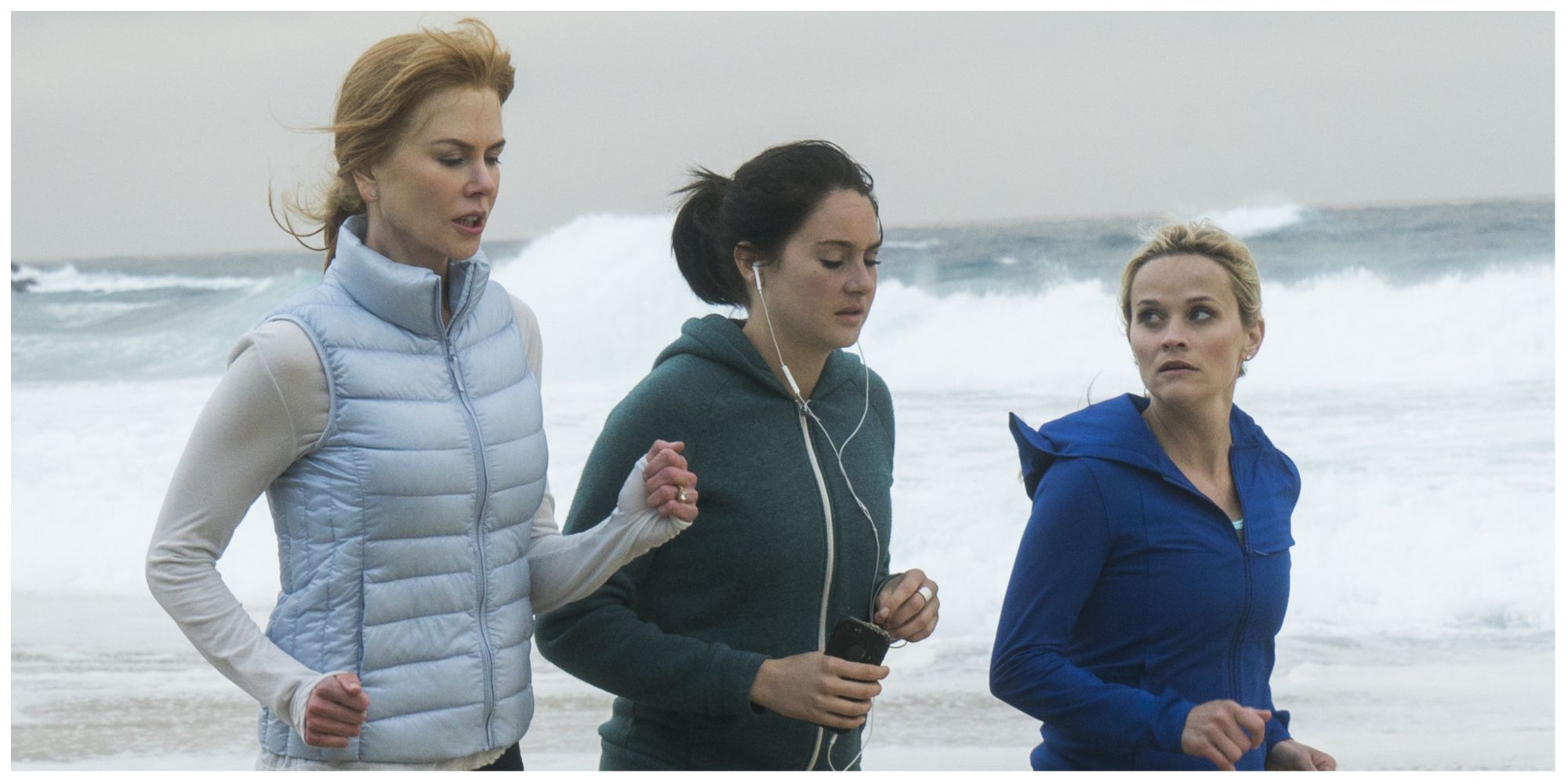 From left to right: Nicole Kidman, Shailene Woodley and Reese Witherspoon running along the beach in Big Little Lies