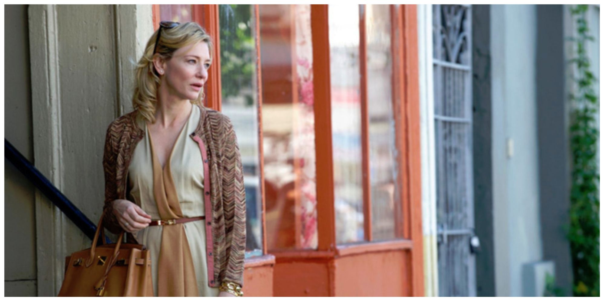 Cate Blanchett in Blue Jasmine stood outside of her sister's apartment building looking anxiously across the street