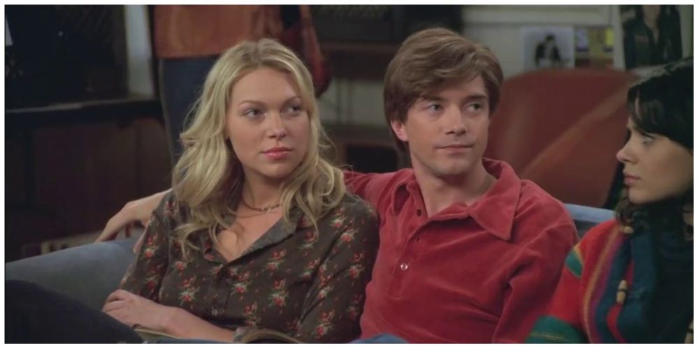 Laura Prepon as Donna Pinciotti. Topher Grace as Eric Forman.