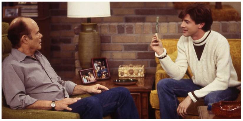 Kurtwood Smith as Red Forman. Topher Grace as Eric Forman.