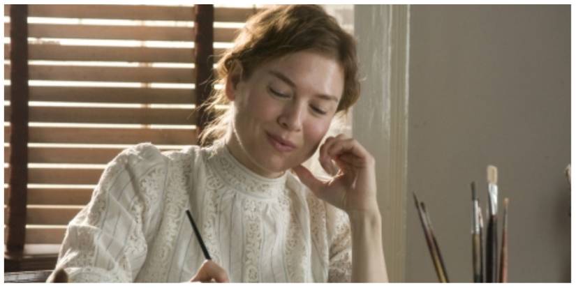 Beatrix Potter smiling to herself as she paints