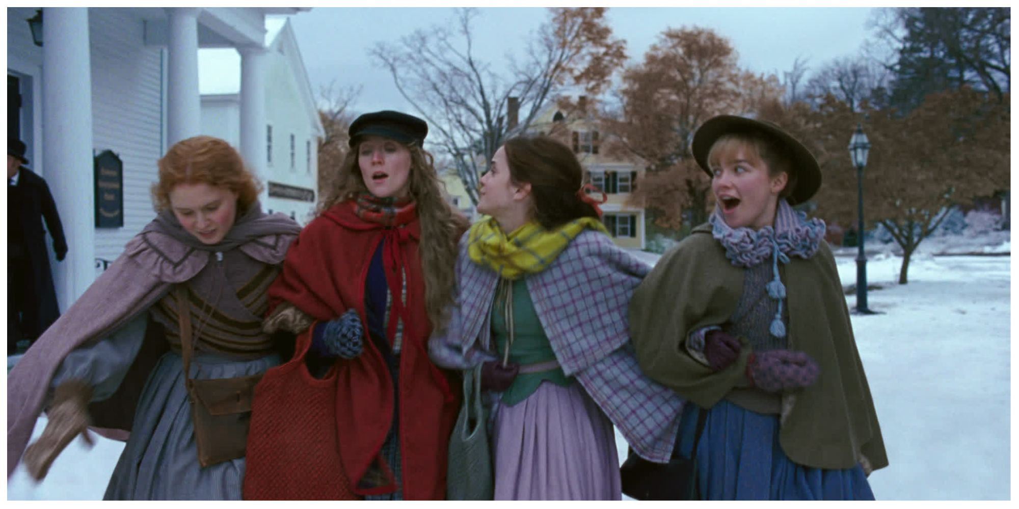 From left to right: Eliza Scanlen as Beth, Saoirse Ronan as Jo, Emma Watson as Meg and Florence Pugh as Amy walking together in Little Women.