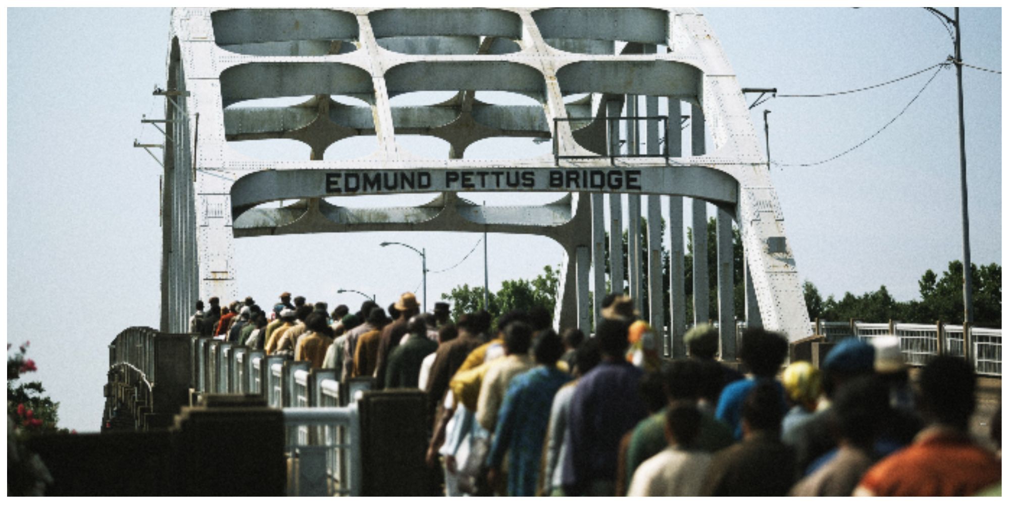 Citizens of Selma walking across the Edmund Pettus Bridge in the 2014 film