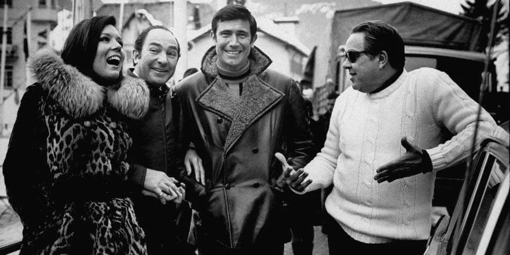 Diana_Rigg_Peter_R_Hunt_George_Lazenby_and_Albert_R_Broccoli_on_the_set_of_On_Her_Majesty's_Secret_Service