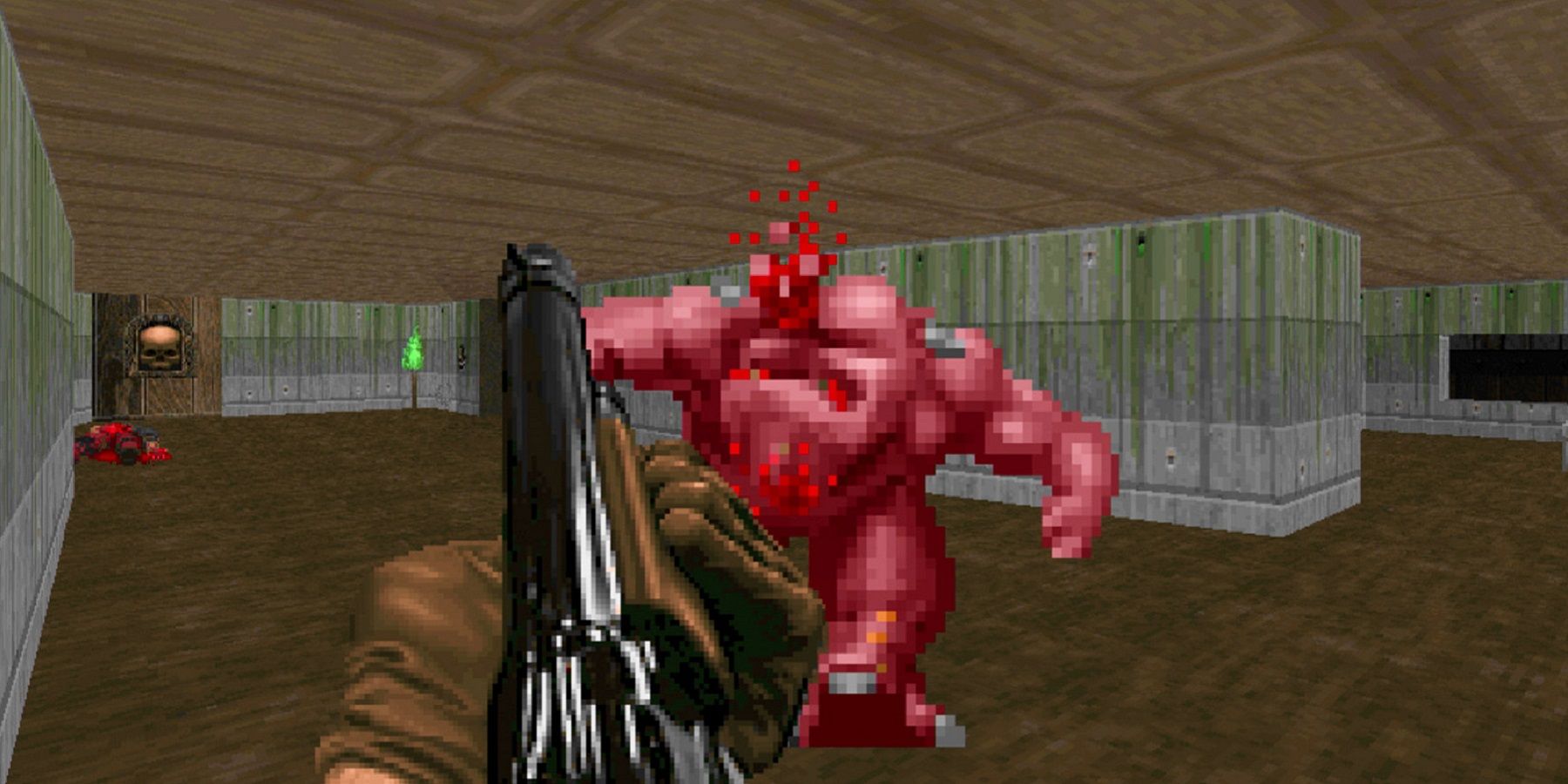 Screenshot from Doom showing the player shooting at a Pinky.