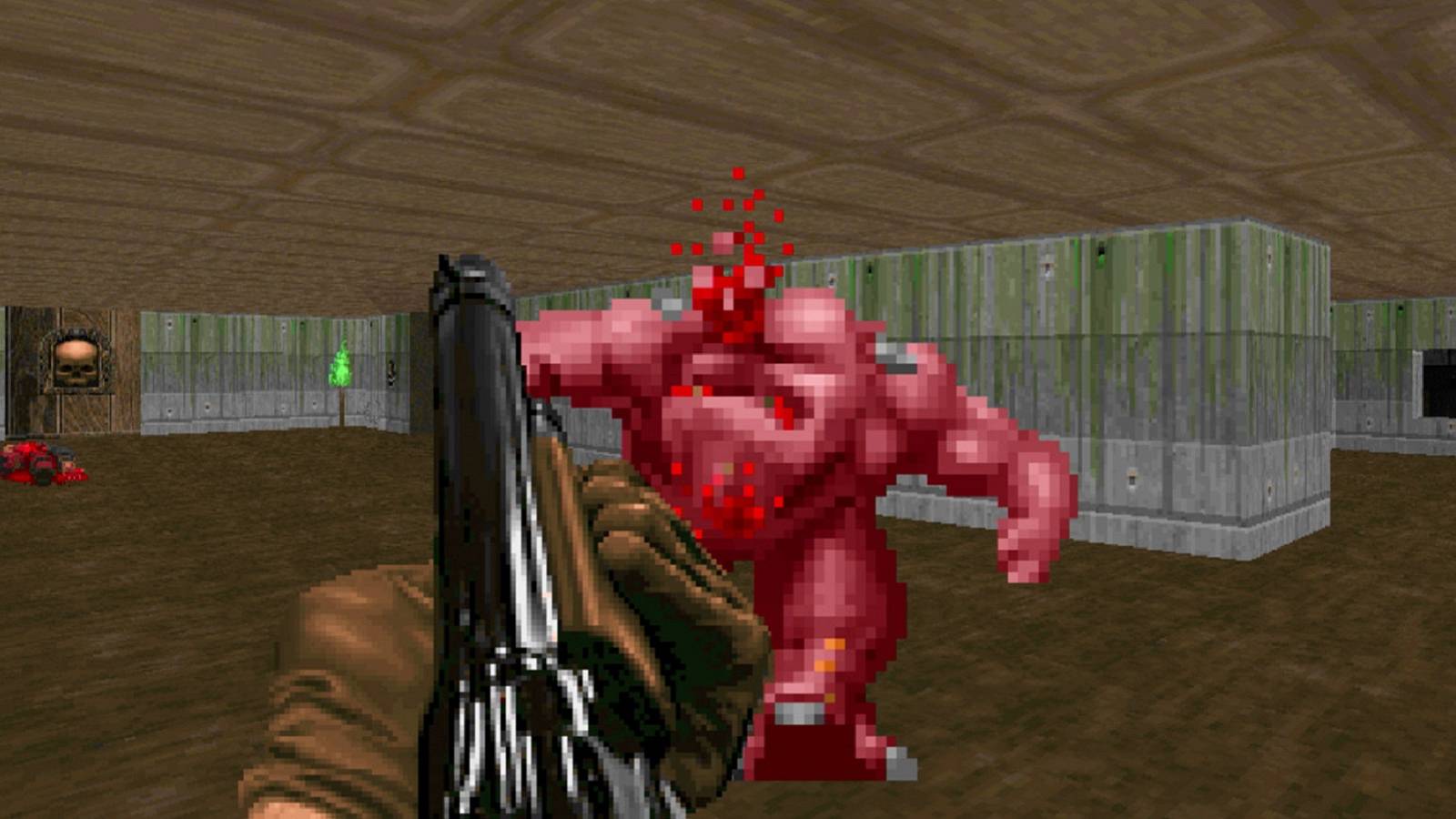 Screenshot from Doom showing the player shooting at a Pinky.