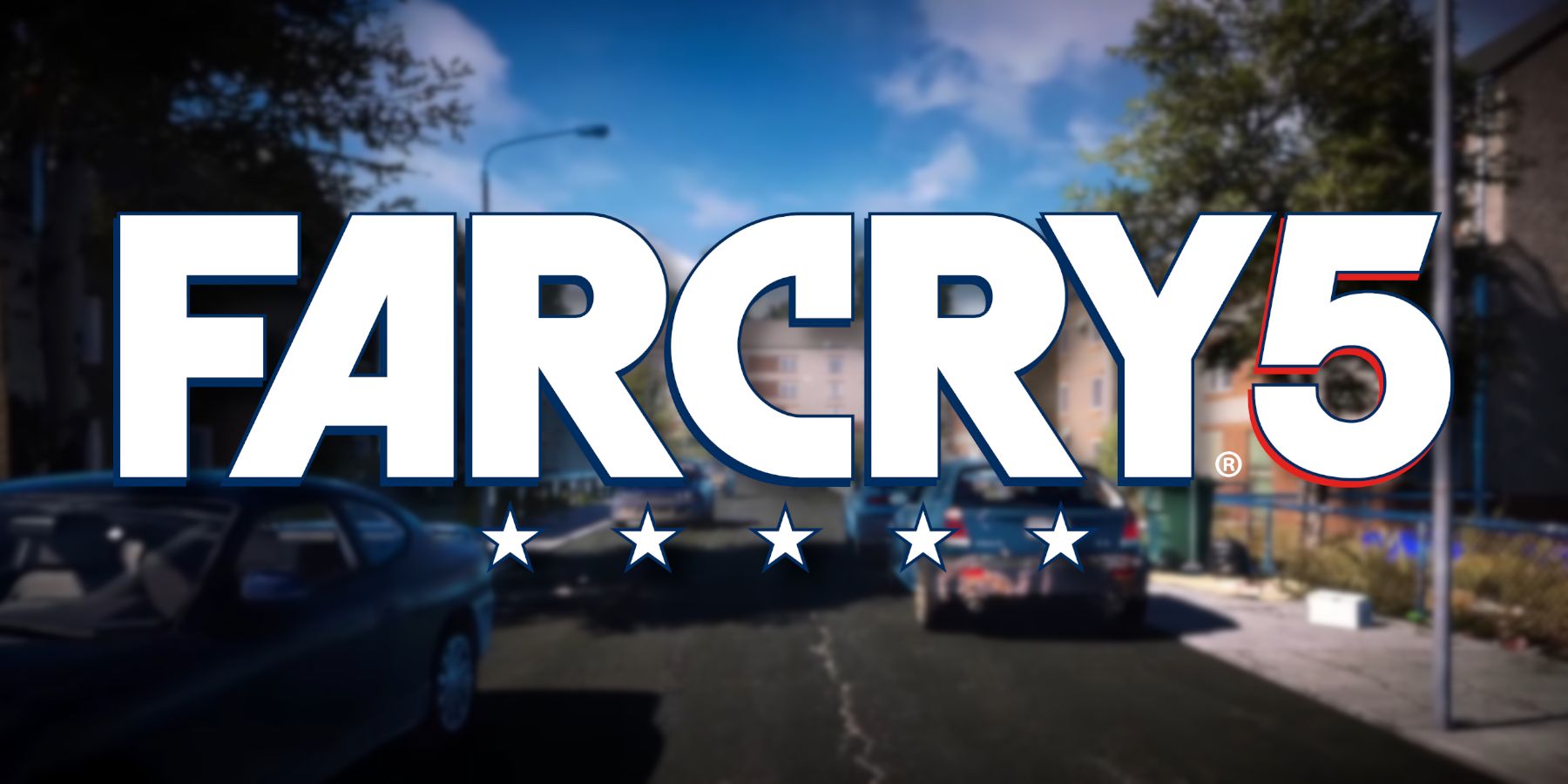 Le logo Far Cry 5 avec une rue écossaise floue derrière.
