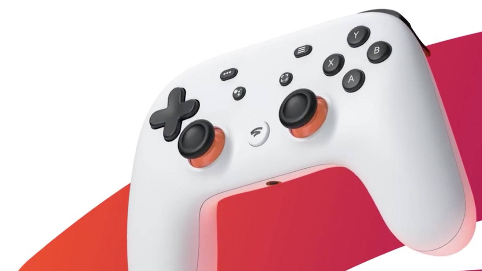close up of google stadia controller with stadia logo in the background