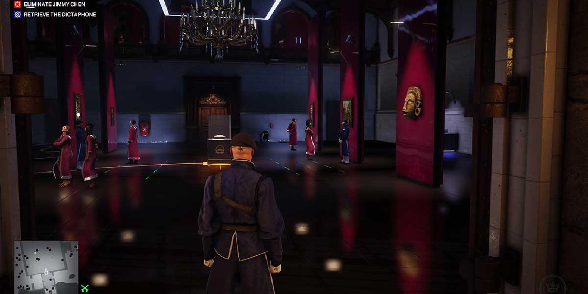 A darkened ballroom plays host to many masked elite.
