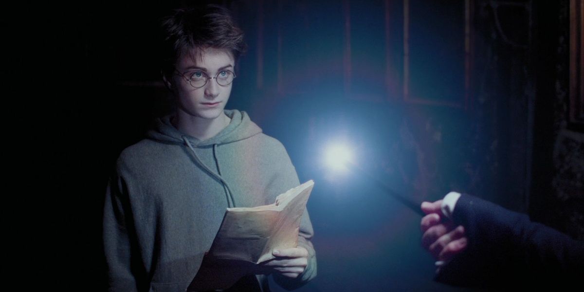 Harry Potter in Harry Potter and the Prisoner of Azkaban with the Marauders Map in hand