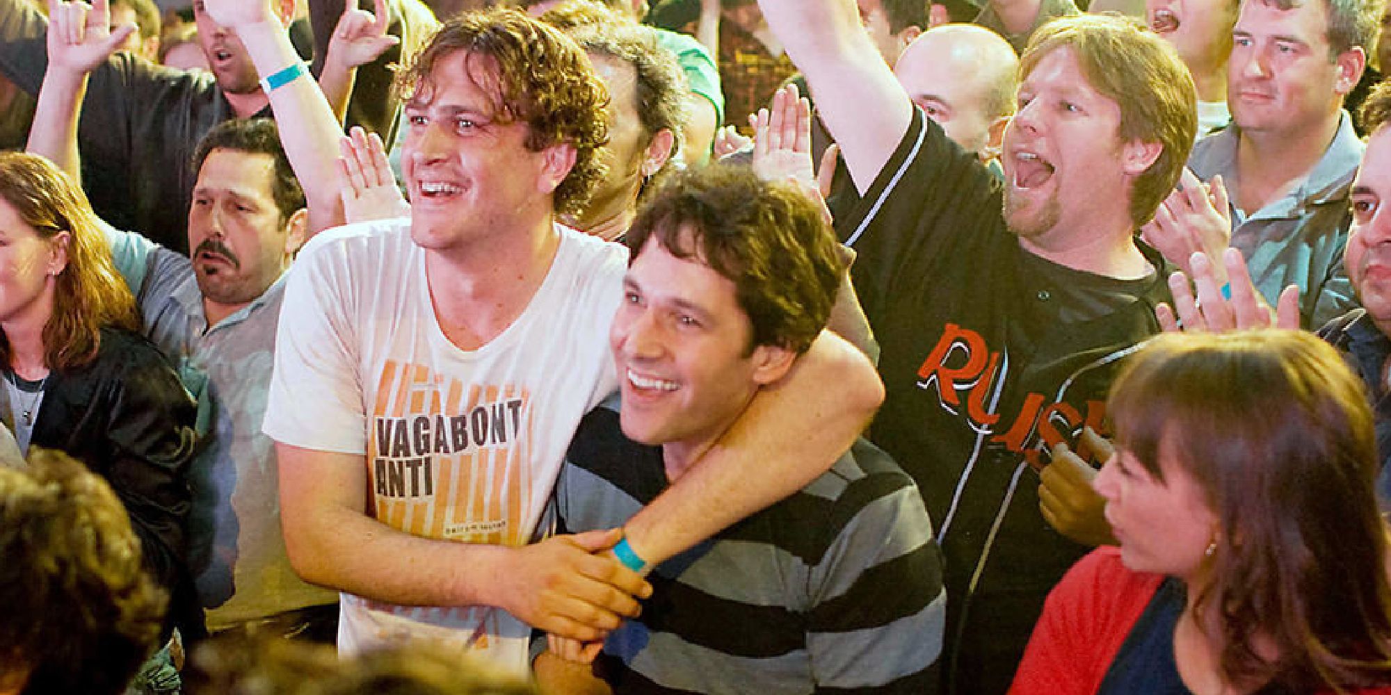 Paul Rudd, Jason Segel, and Rashida Jones at a Rush concert