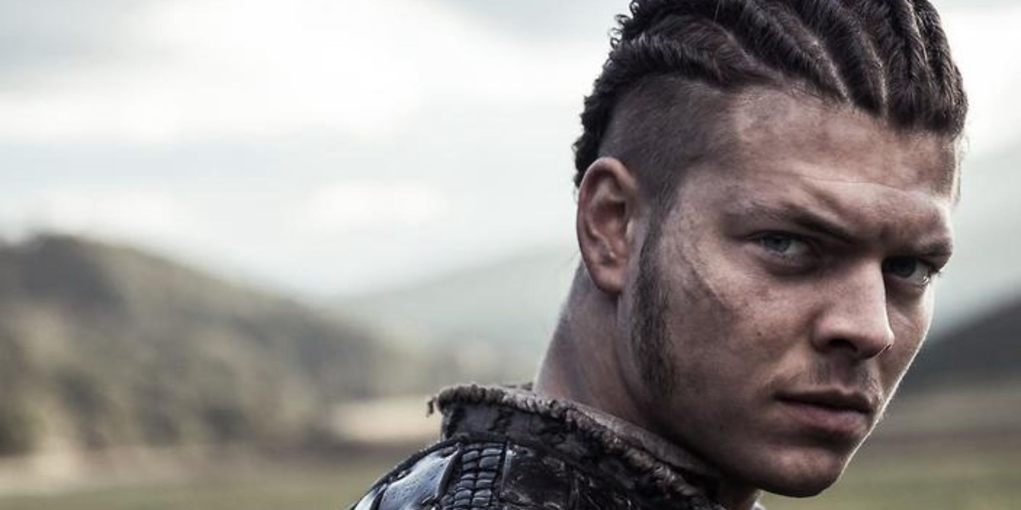 Ivar with cornrows staring into camera