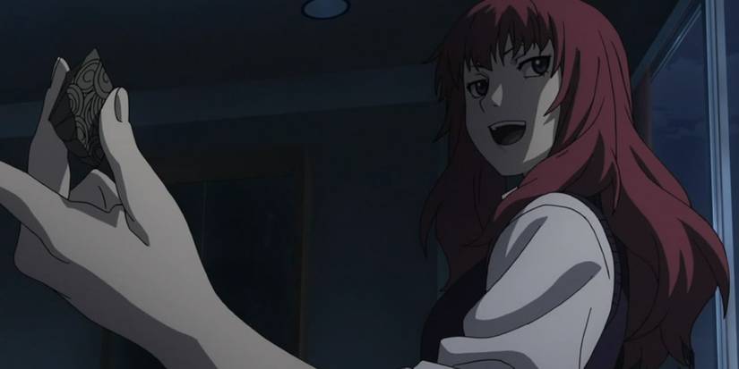 Kobushi Kuroi holding an item