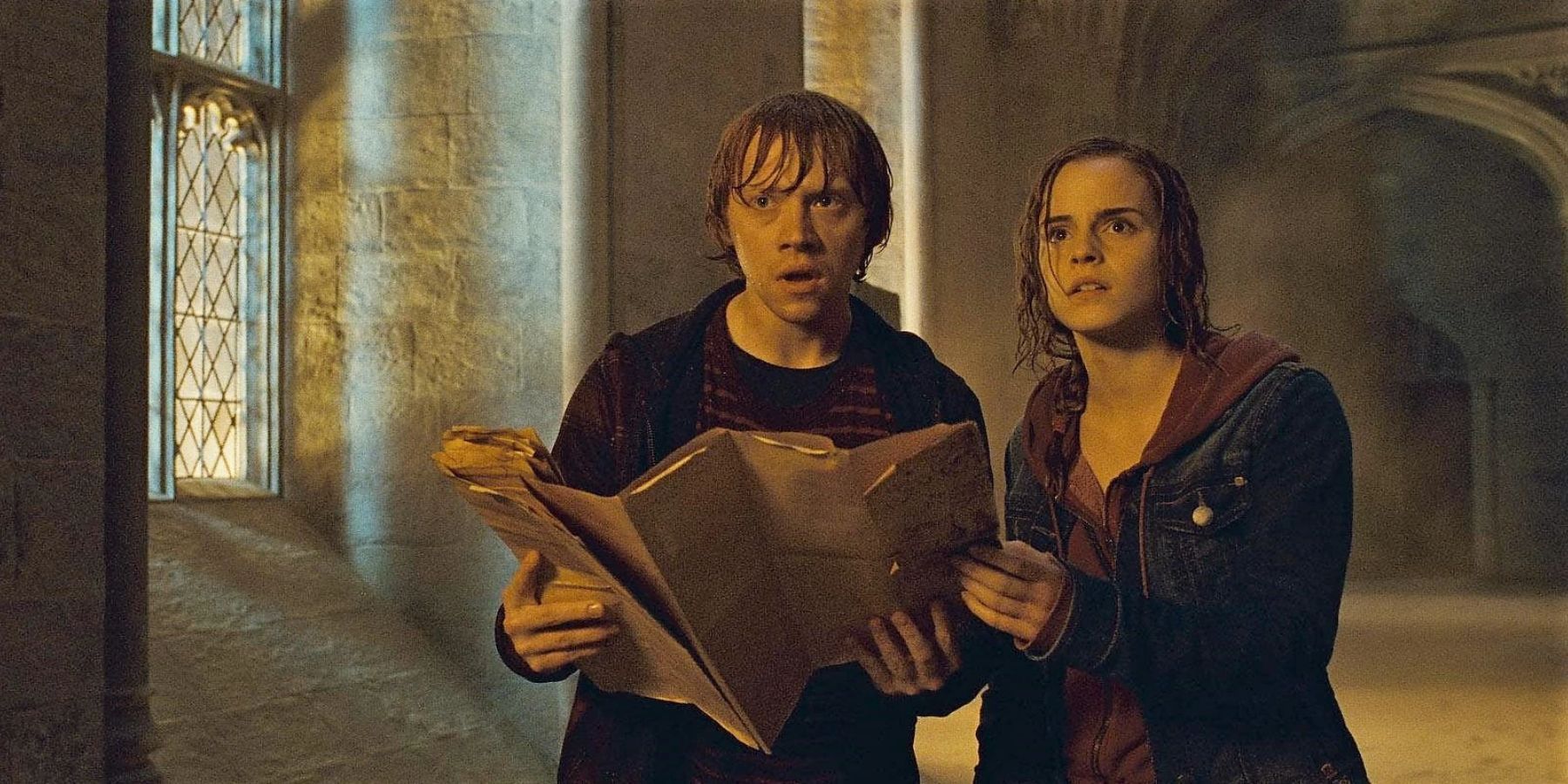Ron and Hermione using the Marauders Map