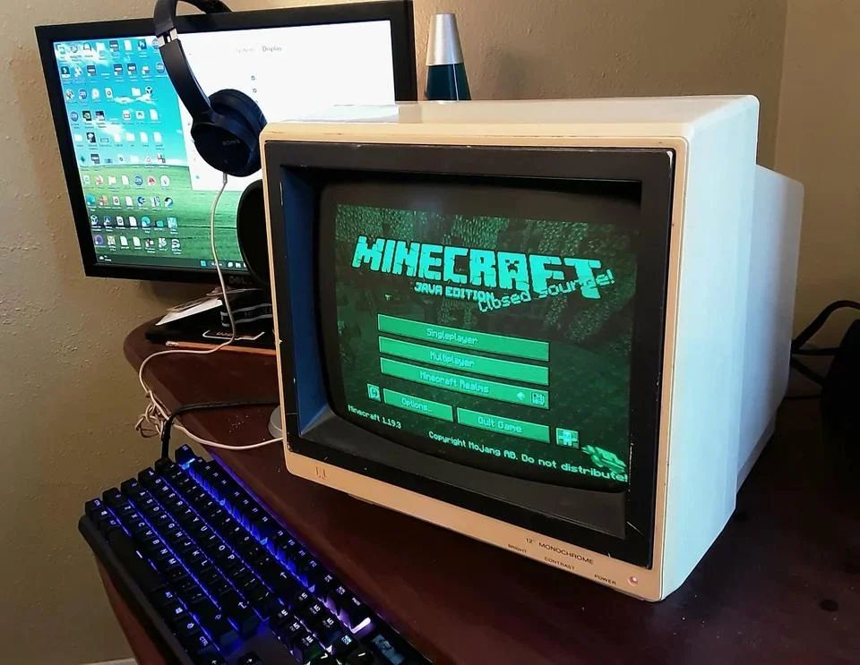 Minecraft running on a 1980s green monochrome monitor