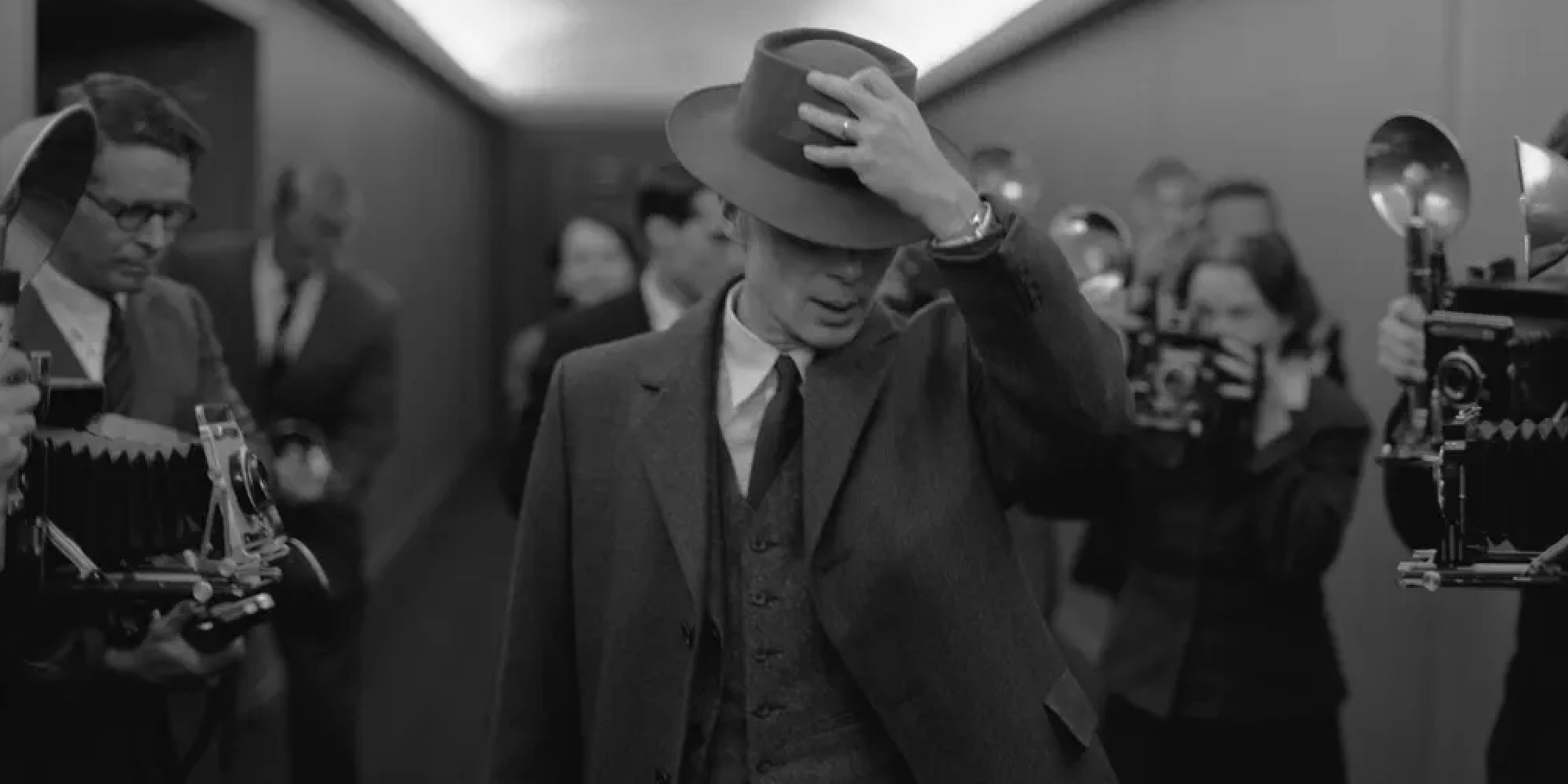 Cillian Murphy avoiding reporters in Oppenheimer