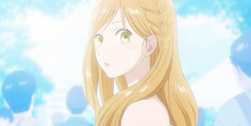 Screenshot of blonde anime girl with blue background