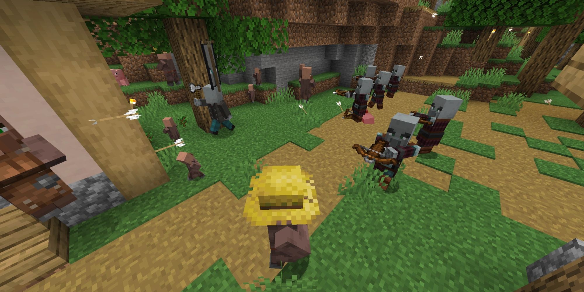 pillagers raiding a village in minecraft