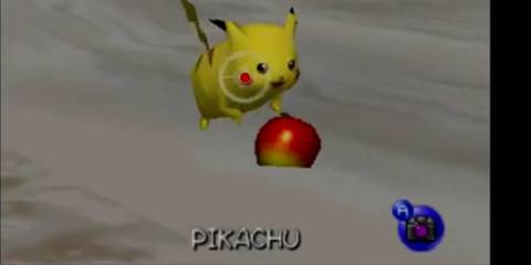 A player taking a photo of Pkachu in Pokemon Snap