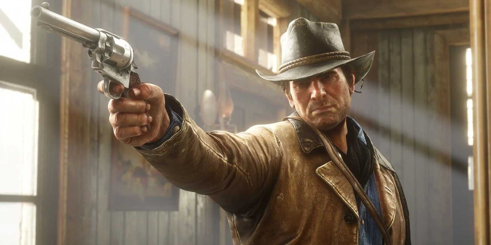 red dead 2's arthur morgan aiming a revolve at an off-scene character