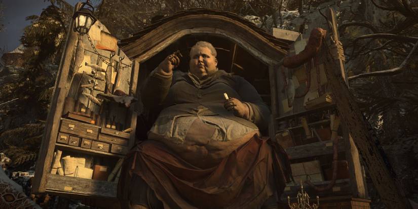 The Duke from Village, perching at the back of his carriage full of goods for purchase. 