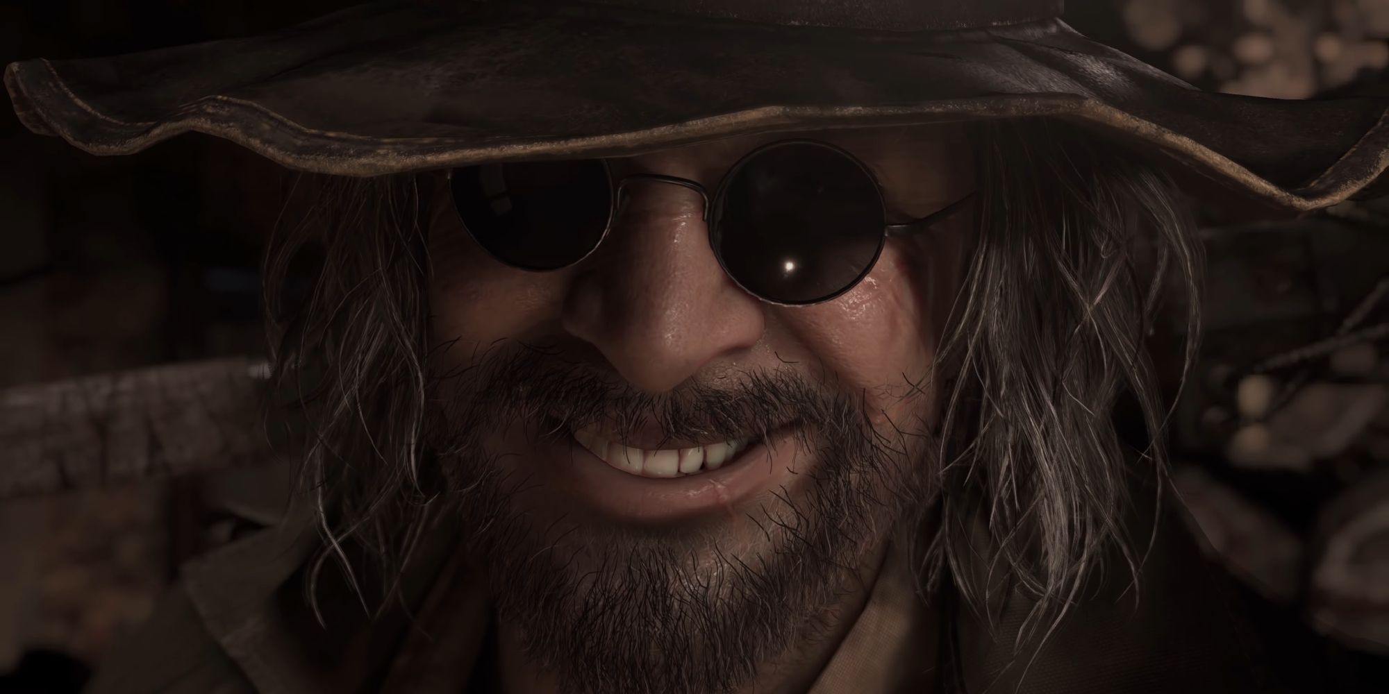 A close-up of one of Village's villains Karl Heisenberg, smiling at the camera.