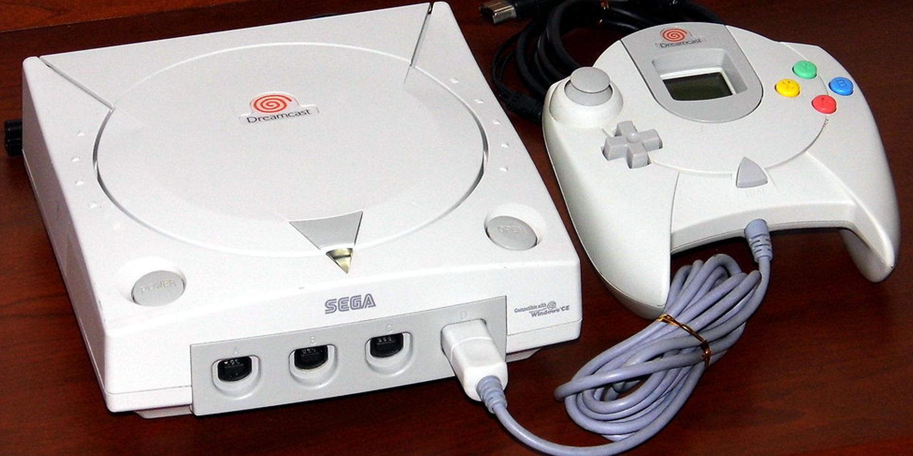 sega-dreamcast-on-table-with-wires