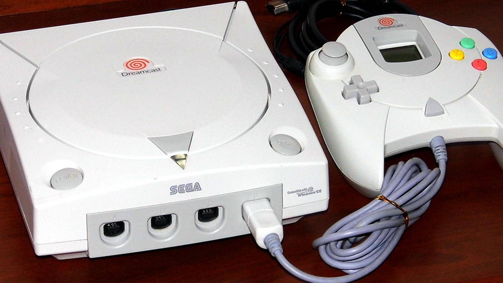 sega-dreamcast-on-table-with-wires