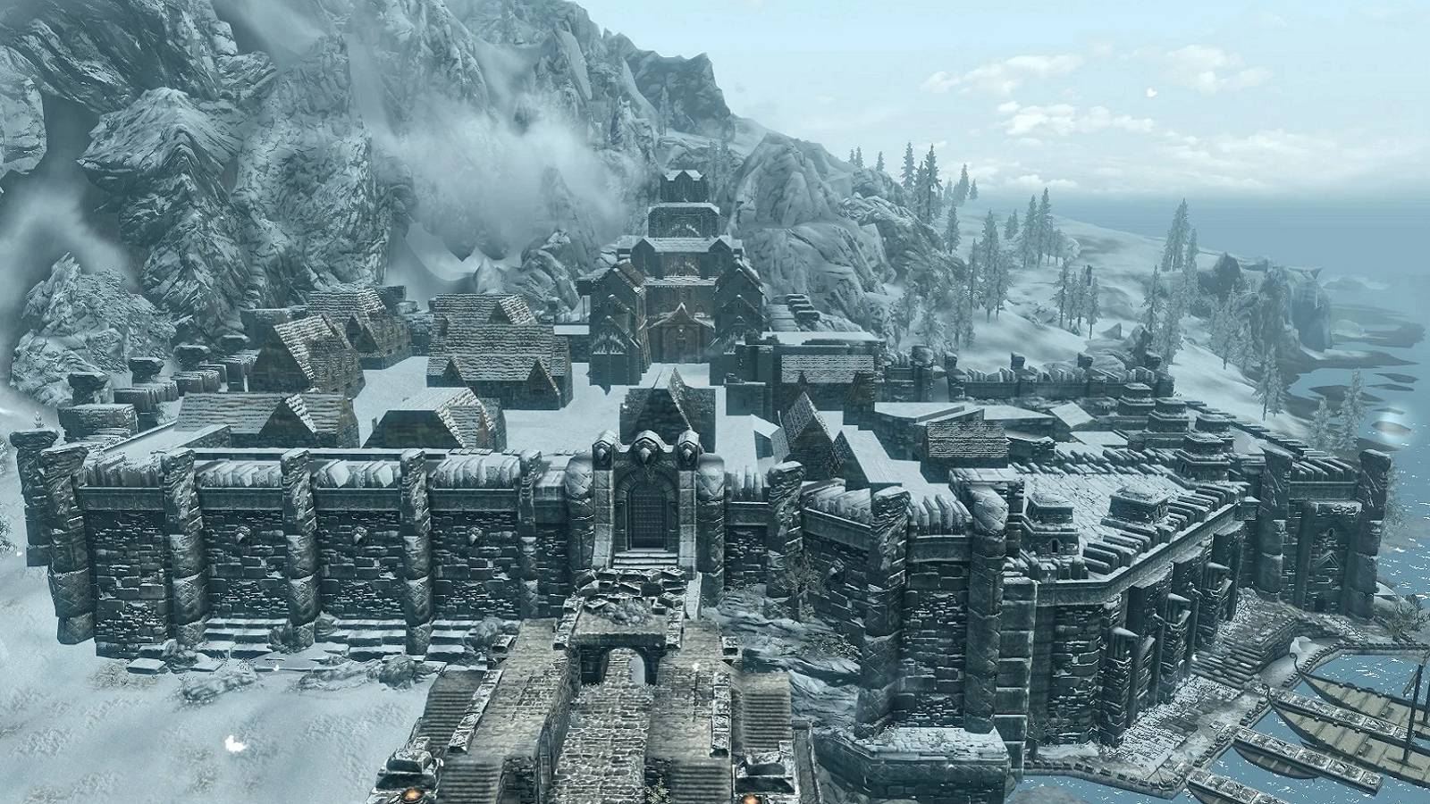 Image from Skyrim showing a wide angle view of the cold city of Windhelm.