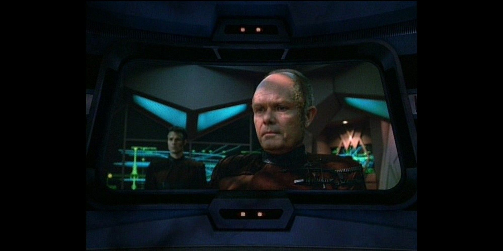 The Krenim temporal ship addresses the crew of Voyager
