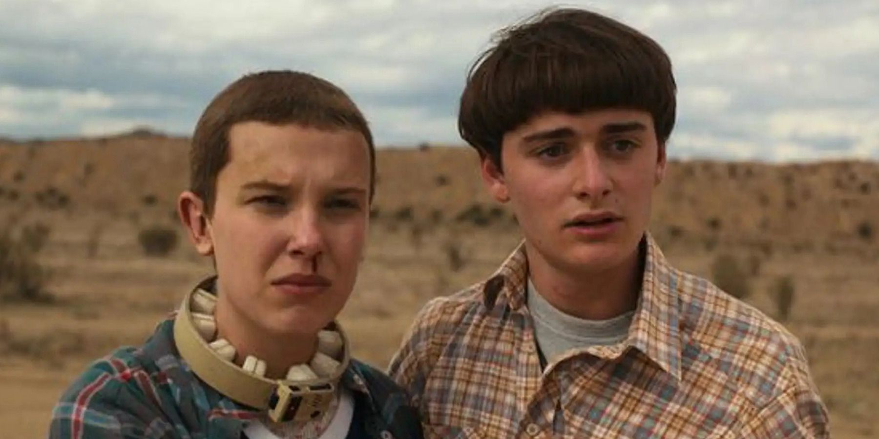 Eleven and Mike looking sad in Stranger Things