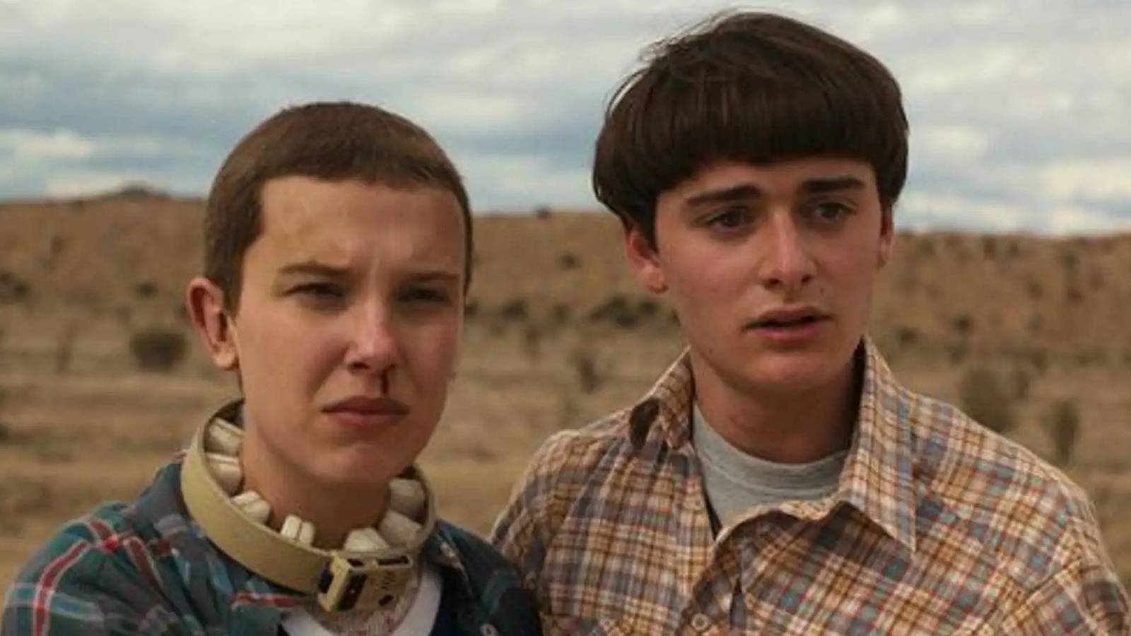 Eleven and Mike looking sad in Stranger Things