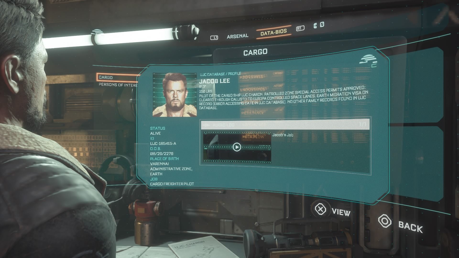 Jacob examining the player menu to select audio logs in The Callisto Protocol 