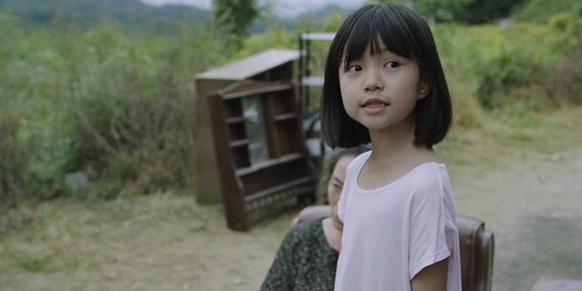 Still from the movie The Mimic, a young girl with short dark hair