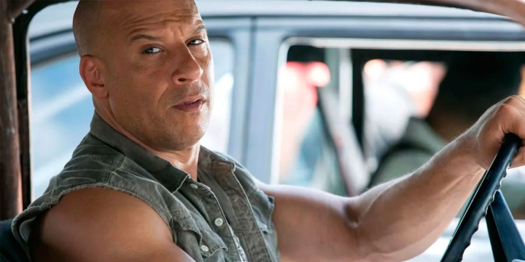 Vin Diesel as Dominic Toretto driving car in Fast and Furious