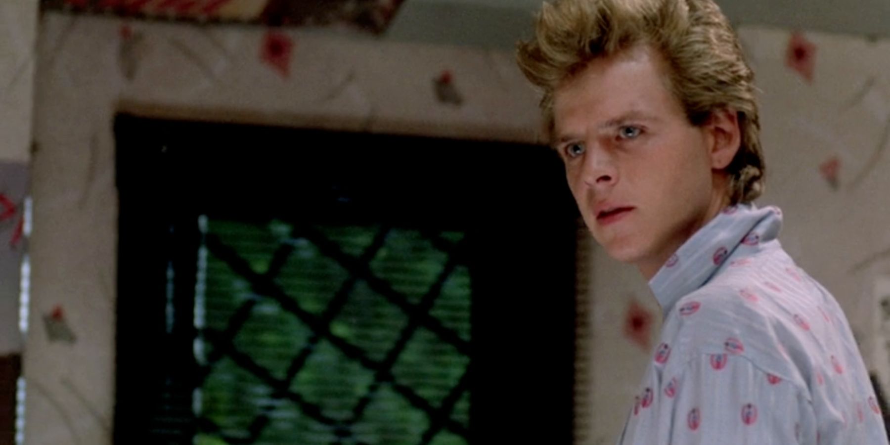 Jesse Walsh looking serious in A Nightmare On Elm Street 2