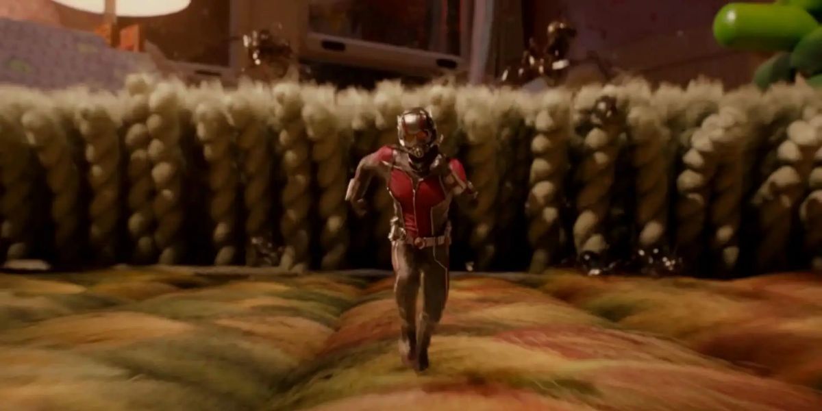 Ant-Man running mid-fight with Yellow Jacket in Ant-Man movie
