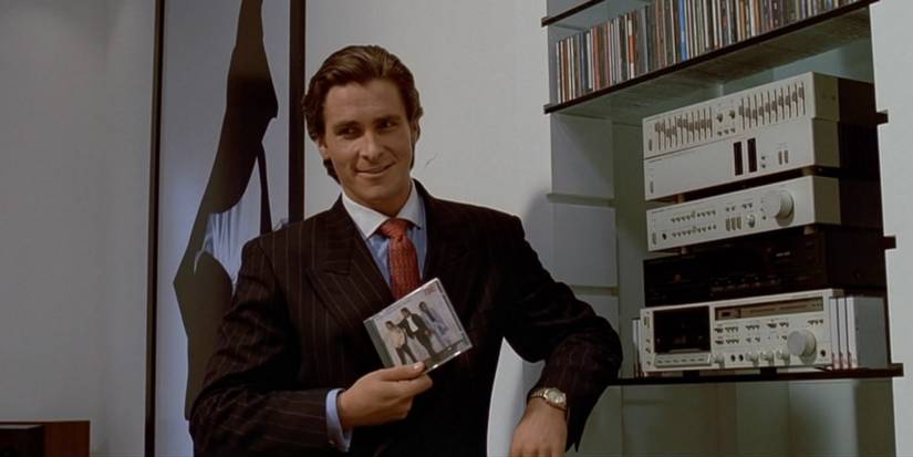 Christian Bale as Patrick Bateman listening to music in American Psycho