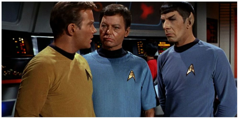 William Shatner as James Kirk. DeForest Kelley as Leonard McCoy. Lenoard Nimoy as Spock.