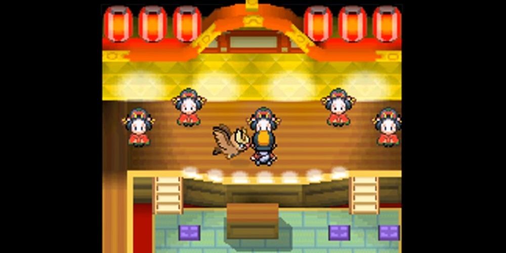 Ethan interacting with a Kimono Girl in Pokemon HeartGold and SoulSilver's Ecruteak Dance Theater