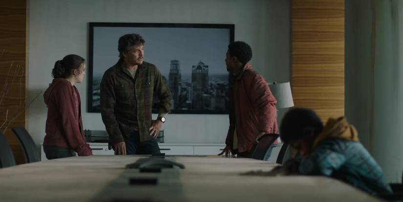 Ellie, Joel, Henry and Sam discussing their escape in The Last of Us.