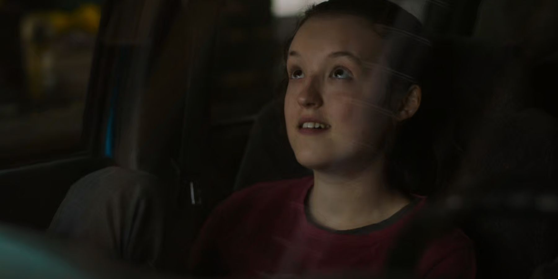 Ellie sitting in Frank's Car in The Last of Us.