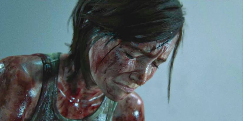 Ellie covered in blood and crying