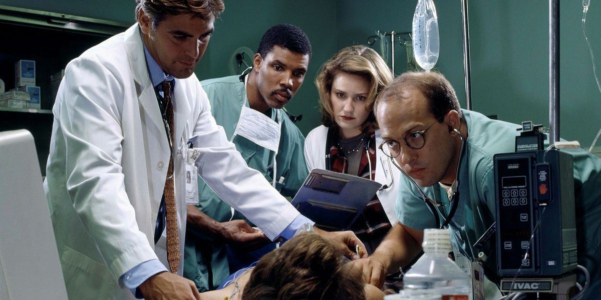 doctors checking on a patient in ER