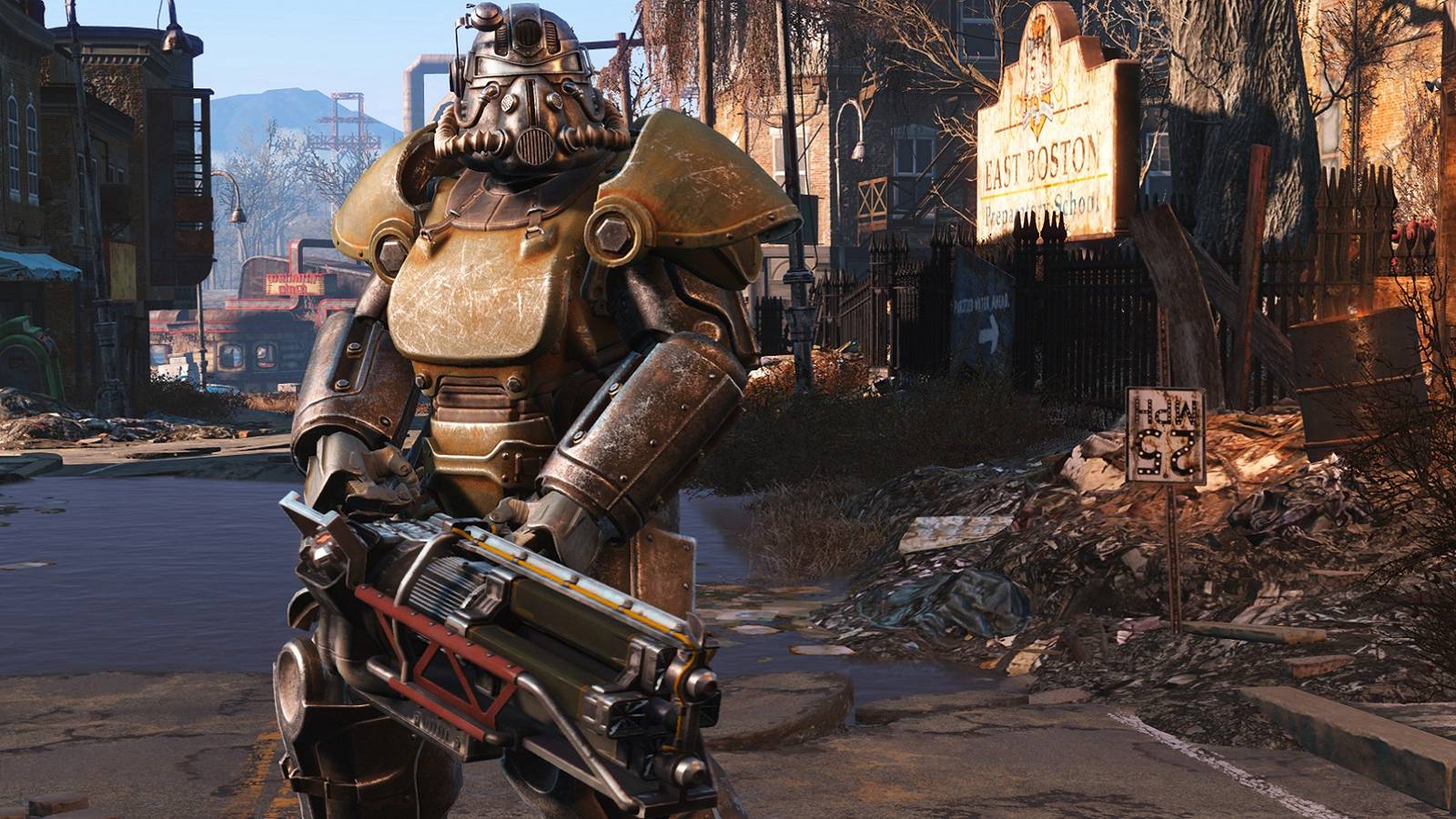 Screenshot from Fallout 4 showing a member of the Brotherhood of Steel holding a gatling laser.