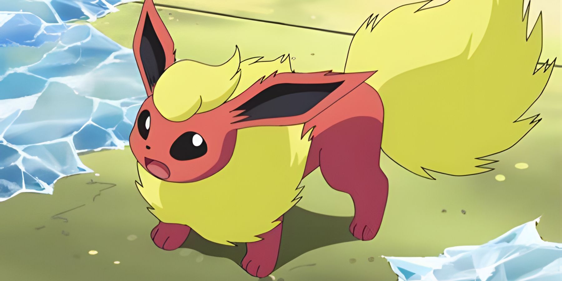 Un Pokémon Flareon en la playa en los dibujos animados de Pokémon.